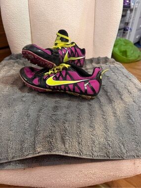 Nike woman’s Pink and Yellow Track Spikes